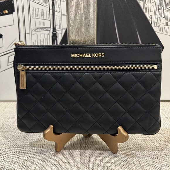 Michael Kors Handbags - Michael Kors Large Zip Wristlet/Clutch Black